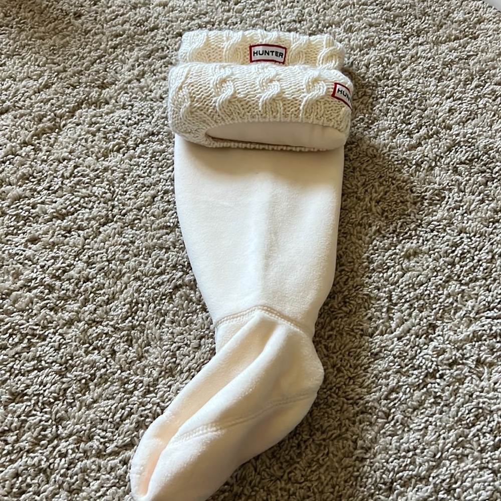 Never been used Hunter Wellies sock for tall rain boot. Knit top.